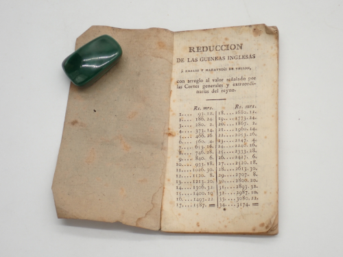 Portada del libro de Reducción de las guineas inglesas a reales y maravedís de vellón, con arreglo al valor señalado por...
