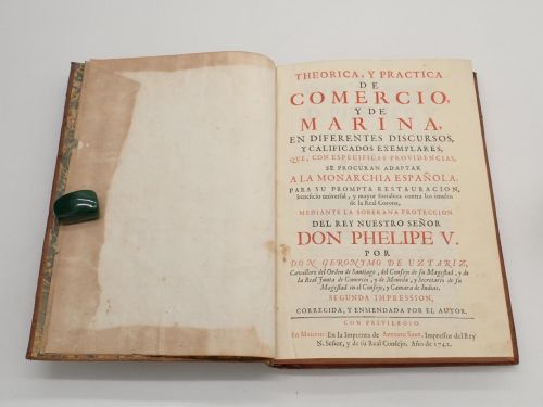 Portada del libro de Theórica, y práctica de comercio, y de marina, en diferentes discursos, y calificados exemplares, que,...
